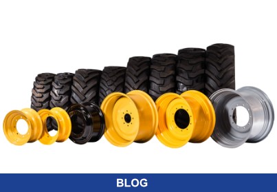 Wheel rims and tires for construction machinery